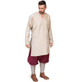Leif Viking Undertunic in Hemp, worn with wool pants and leg wraps, full length front view