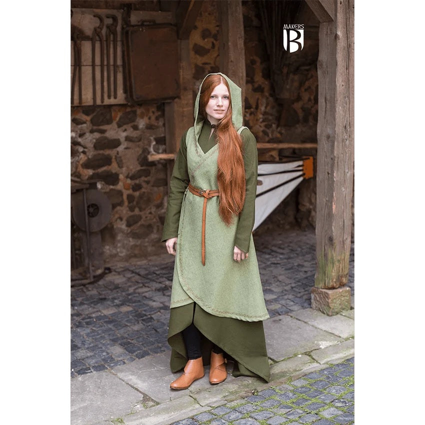 Woman wearing green medieval dress with hood.