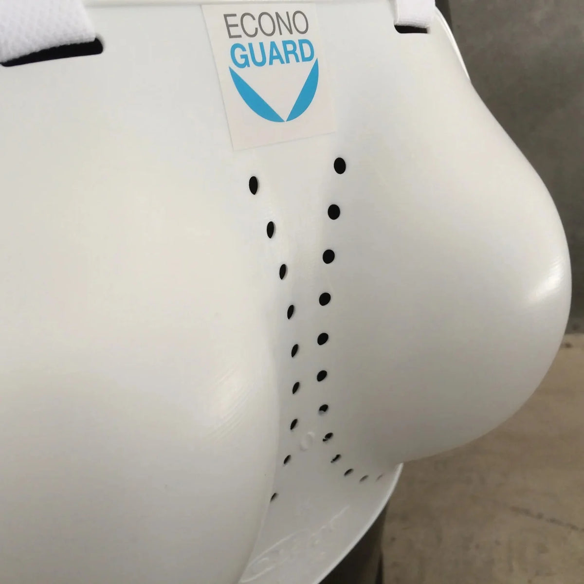 Close detail of rigid women's chest protector.