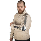 Man wearing padded gambeson and historical jack chain arm armor.
