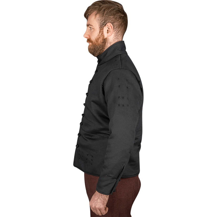 A man shown in profile wearing a black long-sleeve jacket with decorative stitched details on the upper sleeve and a high collar, paired with brown trousers, against a plain white background.
