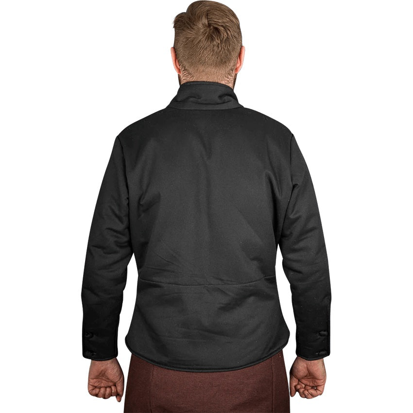 A man viewed from the back wearing a black long-sleeve jacket and brown trousers against a plain white background.