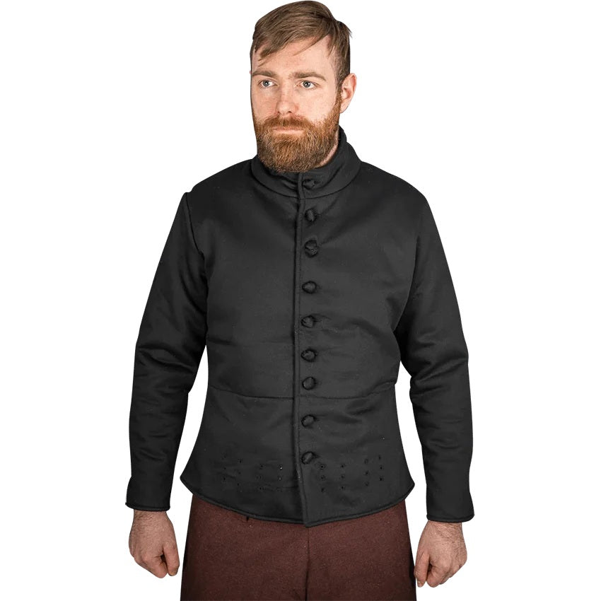 A man wearing a black historical-style doublet jacket with a high mock neck and front buttons, paired with brown trousers, shown against a plain white background.