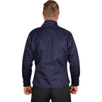 A man viewed from the back wearing a navy blue long-sleeve jacket or overshirt with a stand collar, paired with dark trousers, against a plain white background.