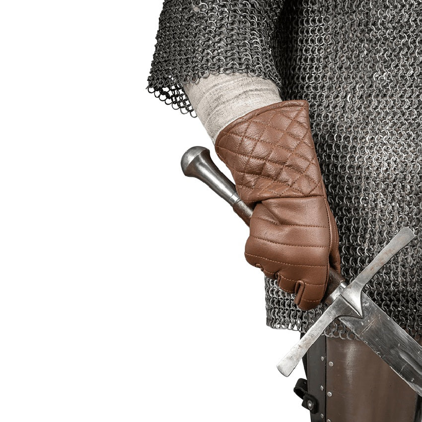 A close-up of a medieval knight's hand wearing a brown quilted leather glove, holding a sword hilt, with chainmail armor and a silver crossguard visible against a white background.