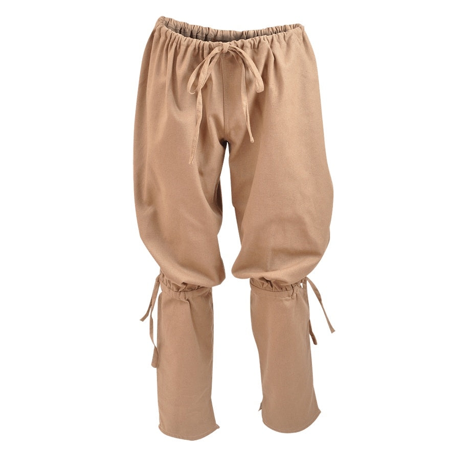 A pair of loose-fitting tan linen pants with an elastic drawstring waist and matching drawstrings at the cuffs, shown against a plain white background.