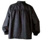Black medieval shirt, rear view against a white background.